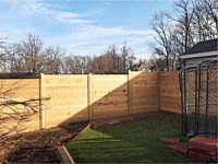 <b>6 foot Horizontal cedar stepped fencing with no spacing between the pickets with standard black post caps</b>